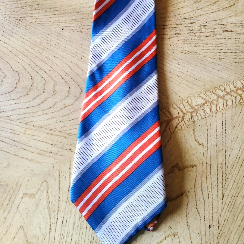 Ted Lapidus silk tie made in France.